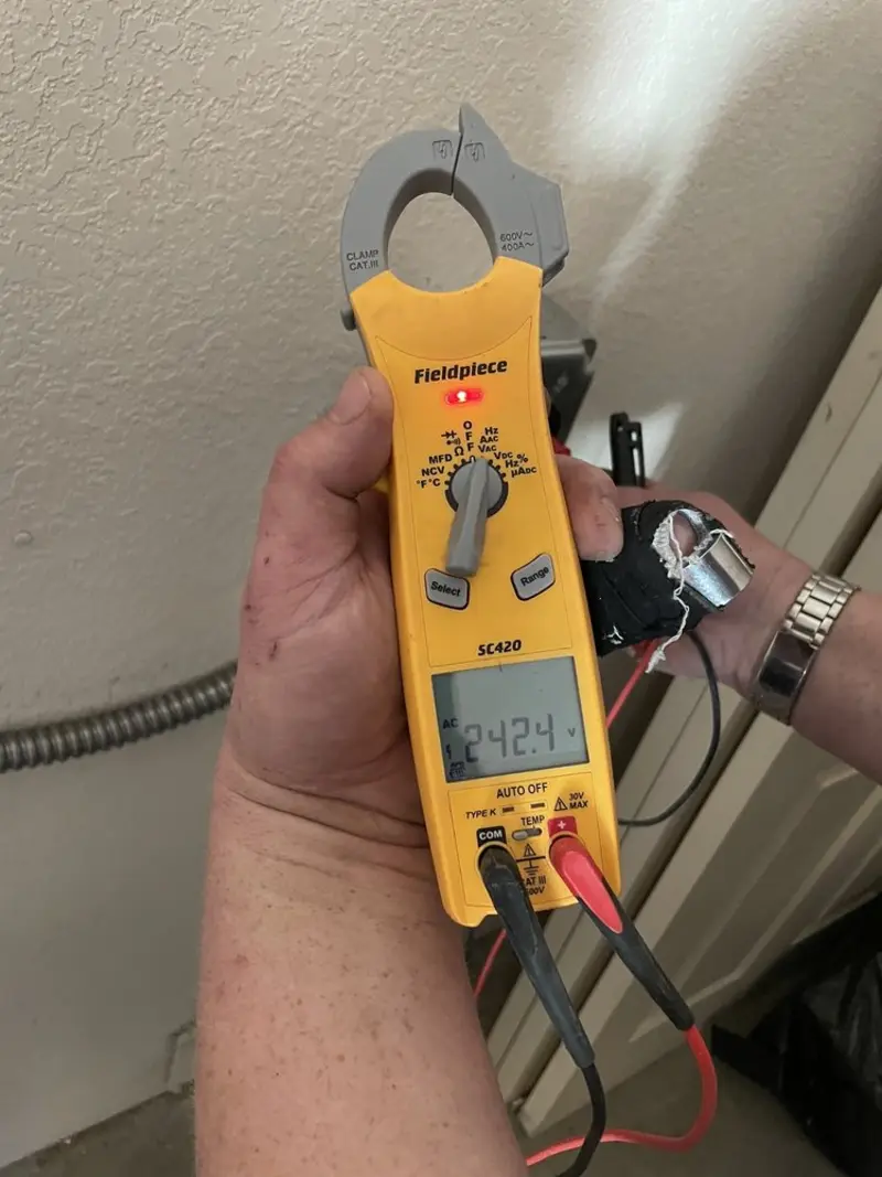 Voltage testing with clamp meter during Circuit Breaker Repair in Trenton